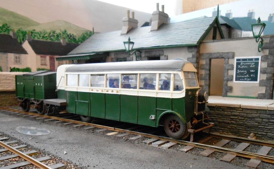 E19.   SL&NCR Railbus 2A with its baggage trailer at Arigna Town on David Holman's layout..........Kit price £4